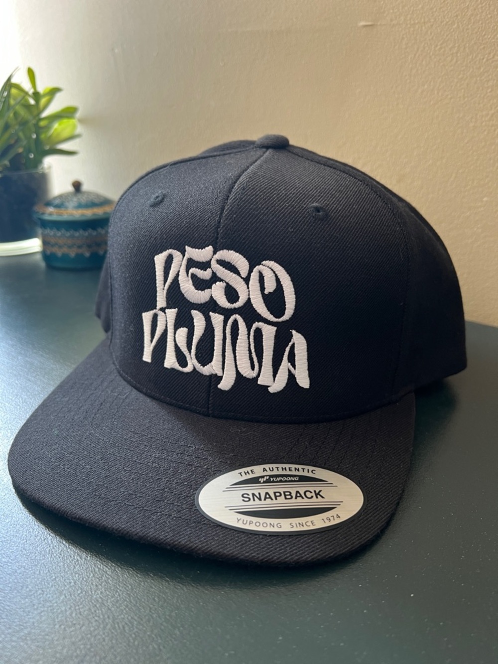Peso Pluma Black Snapback Hat with White Embroidery